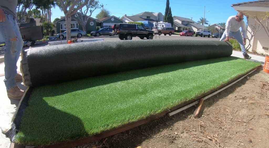 Professional team installing artificial grass in Poinciana